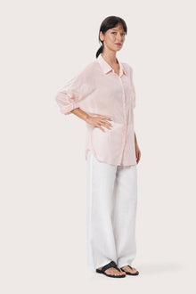 By The Sea Bali Side profile of the Kami Shirt showcasing its relaxed fit and fluid drape