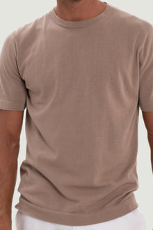 Soft premium knit texture crafted in a sophisticated Creme tone