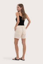 Elegant back view showcasing the clean tailoring and effortless fit