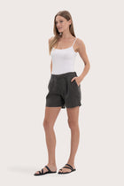 Lightweight linen bermuda shorts designed for refined tropical dressing