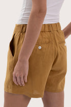 Detailed view highlighting premium linen texture and refined tailoring craftsmanship