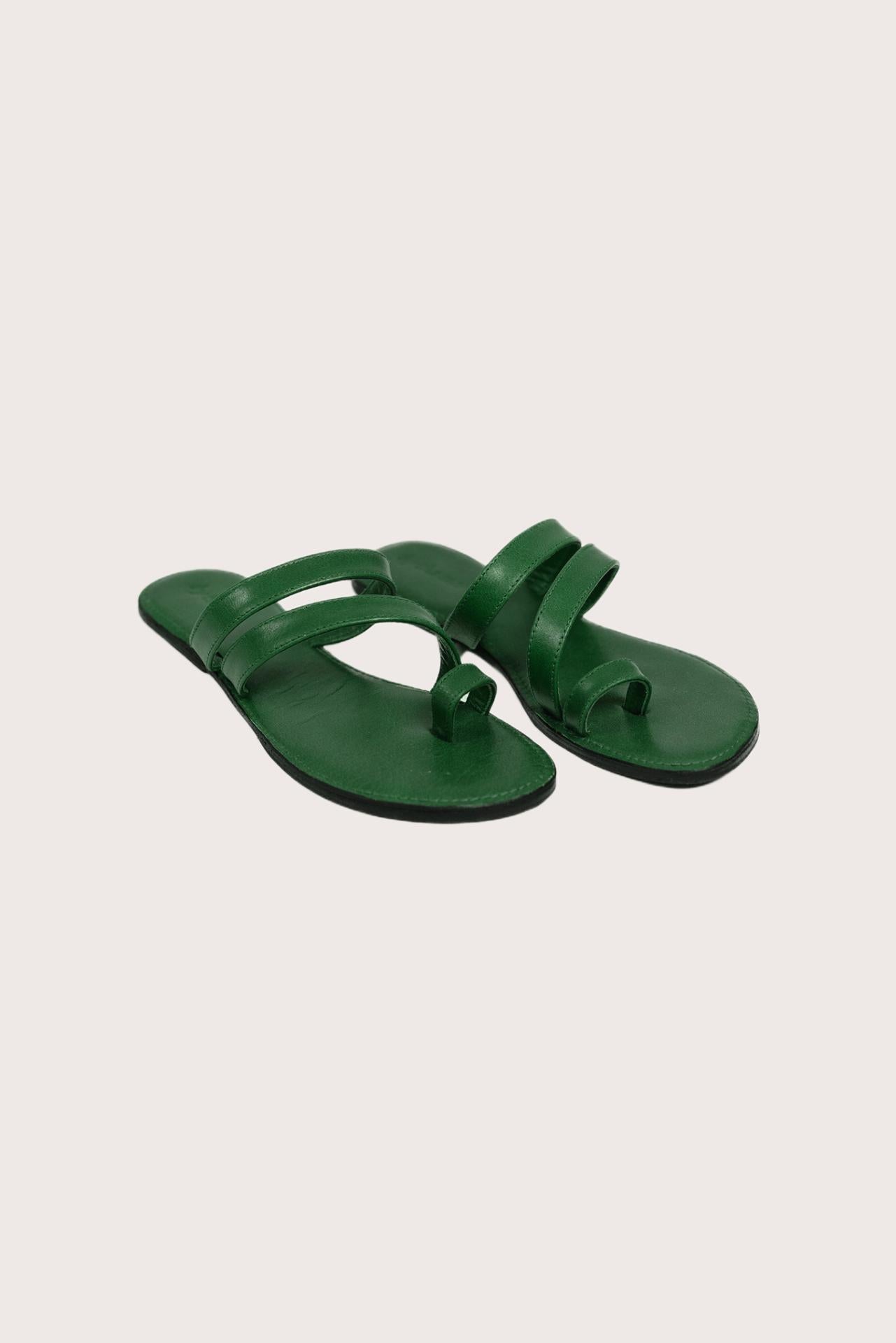 Kawula sandal in forest green front view showcasing elegant straps and minimalist resort aesthetic