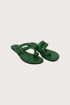 Kawula sandal in forest green front view showcasing elegant straps and minimalist resort aesthetic