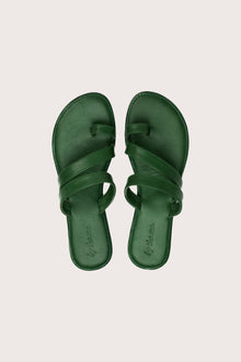 Kawula sandal in forest green shown in a global view highlighting its full silhouette and refined resort design