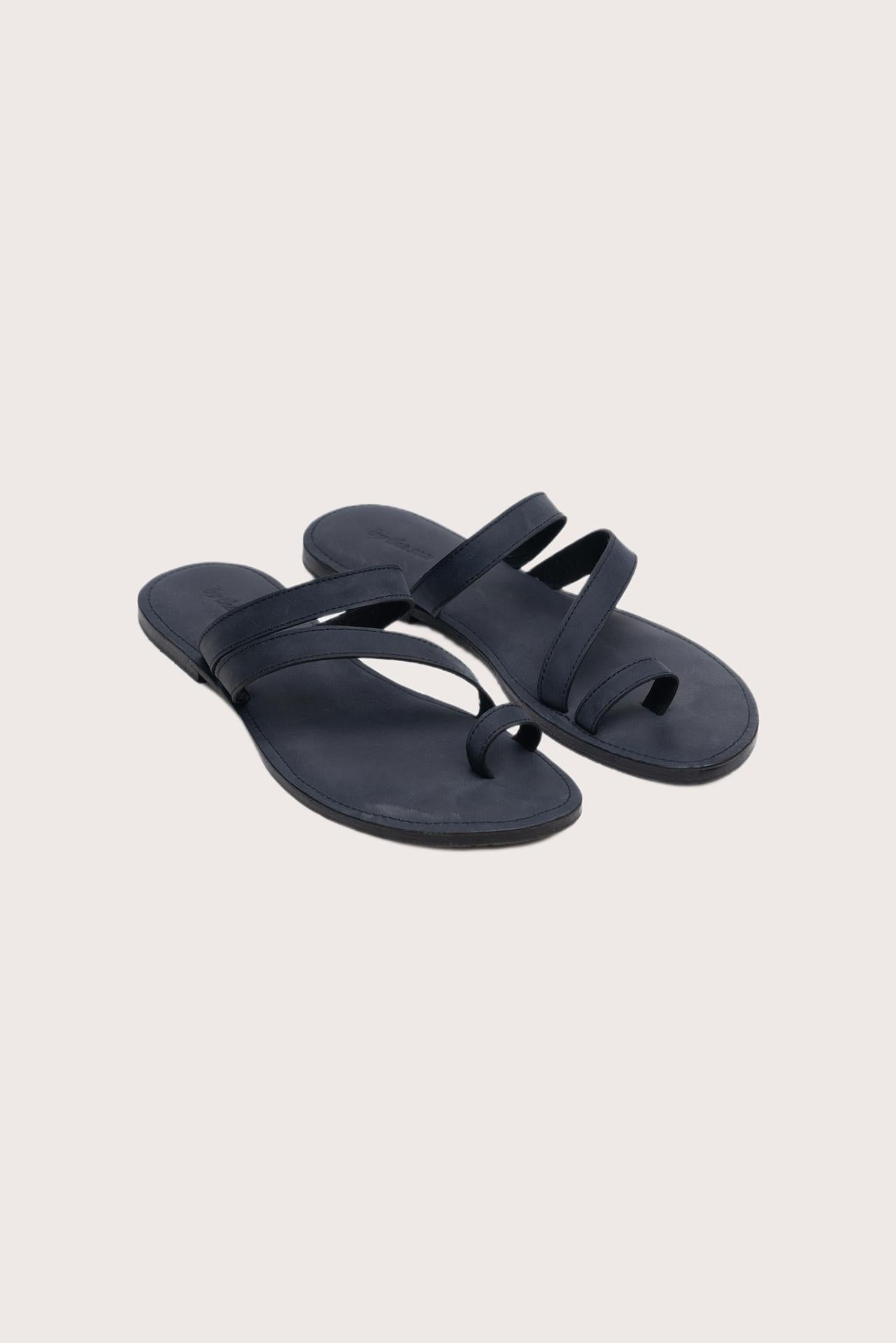 Kawula sandal in navy front view showcasing elegant straps and minimalist resort aesthetic