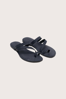 Kawula sandal in navy front view showcasing elegant straps and minimalist resort aesthetic