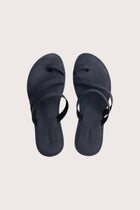 Kawula sandal in navy shown in a global view highlighting its full silhouette and refined resort design