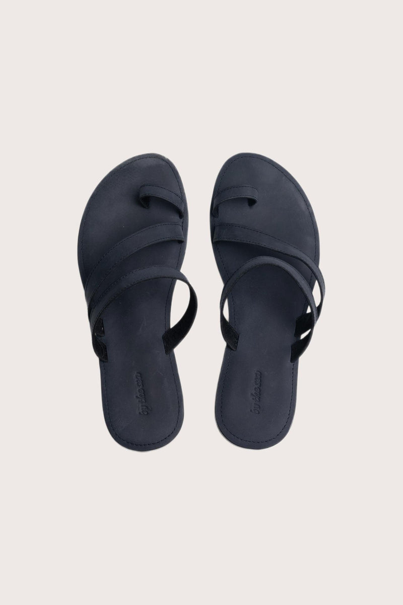 Kawula sandal in navy shown in a global view highlighting its full silhouette and refined resort design