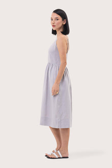 Side profile of the Kei Linen Breeze Midi Dress Grey showing its cut and natural movement