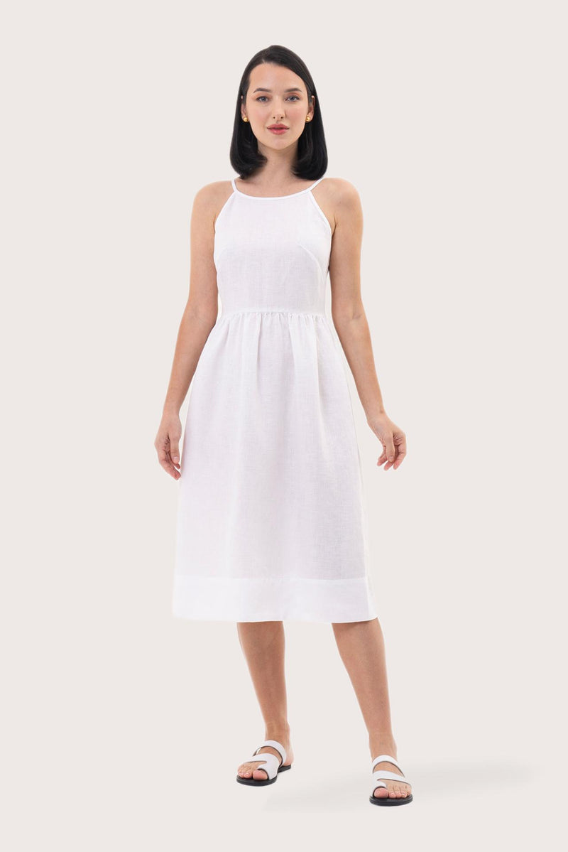 Woman wearing the Kei Linen Breeze Midi Dress White designed for effortless resortwear and tropical living by By The Sea Bali