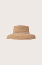 Side profile of the natural straw Keira hat showcasing its classic wide-brim silhouette