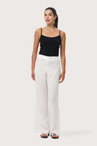 Front view of the Kerang Linen Pant Off White showcasing its silhouette and relaxed fit.