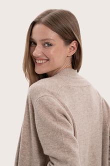 Detailed back view highlighting the elegant silhouette and cashmere craftsmanship