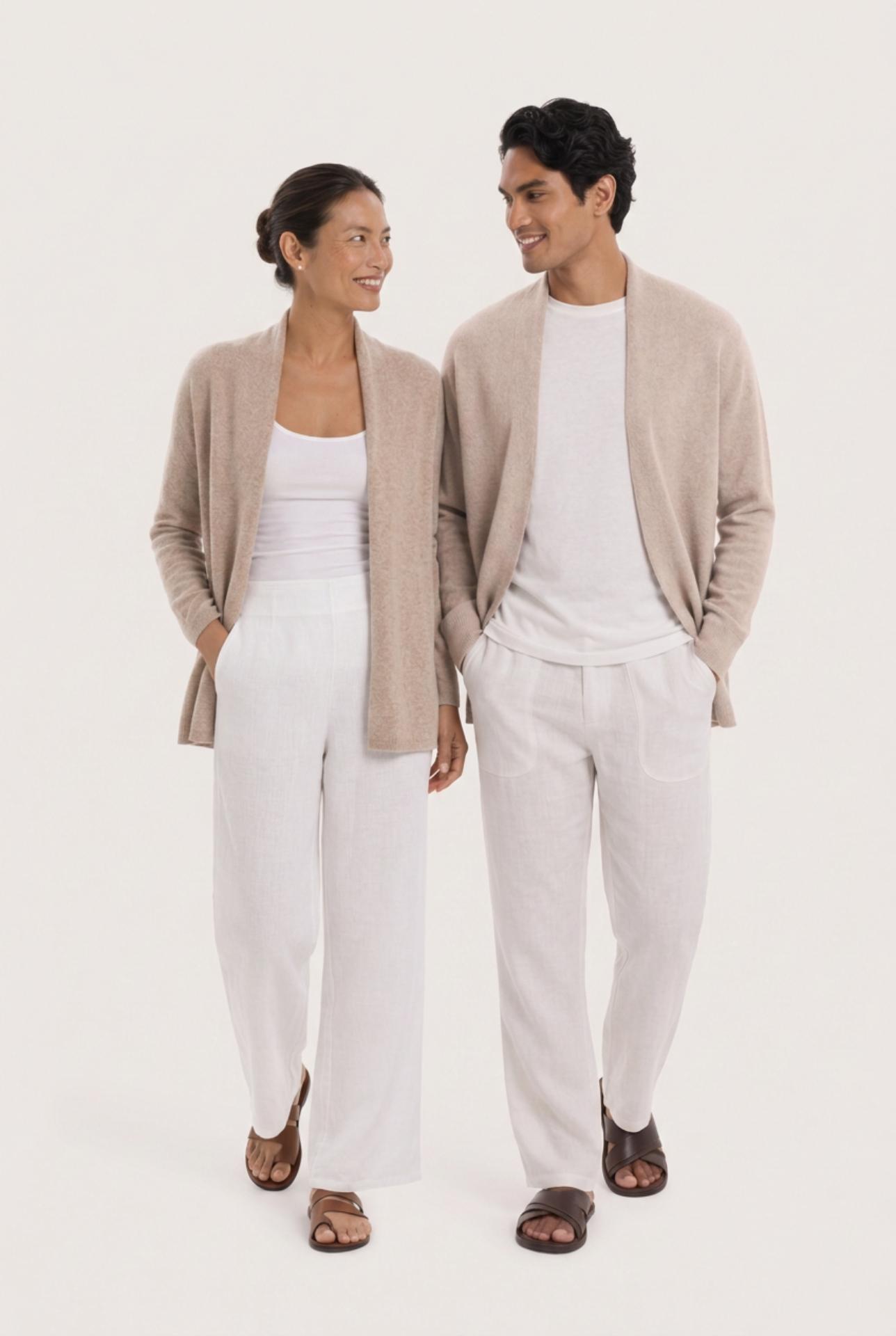 Couple wearing the beige cashmere Klarr outerwear by By The Sea Bali