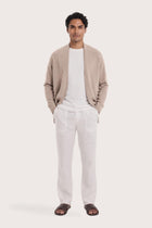 Man wearing the beige cashmere Klarr outerwear by By The Sea Bali
