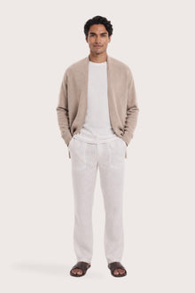 Man wearing the beige cashmere Klarr outerwear by By The Sea Bali