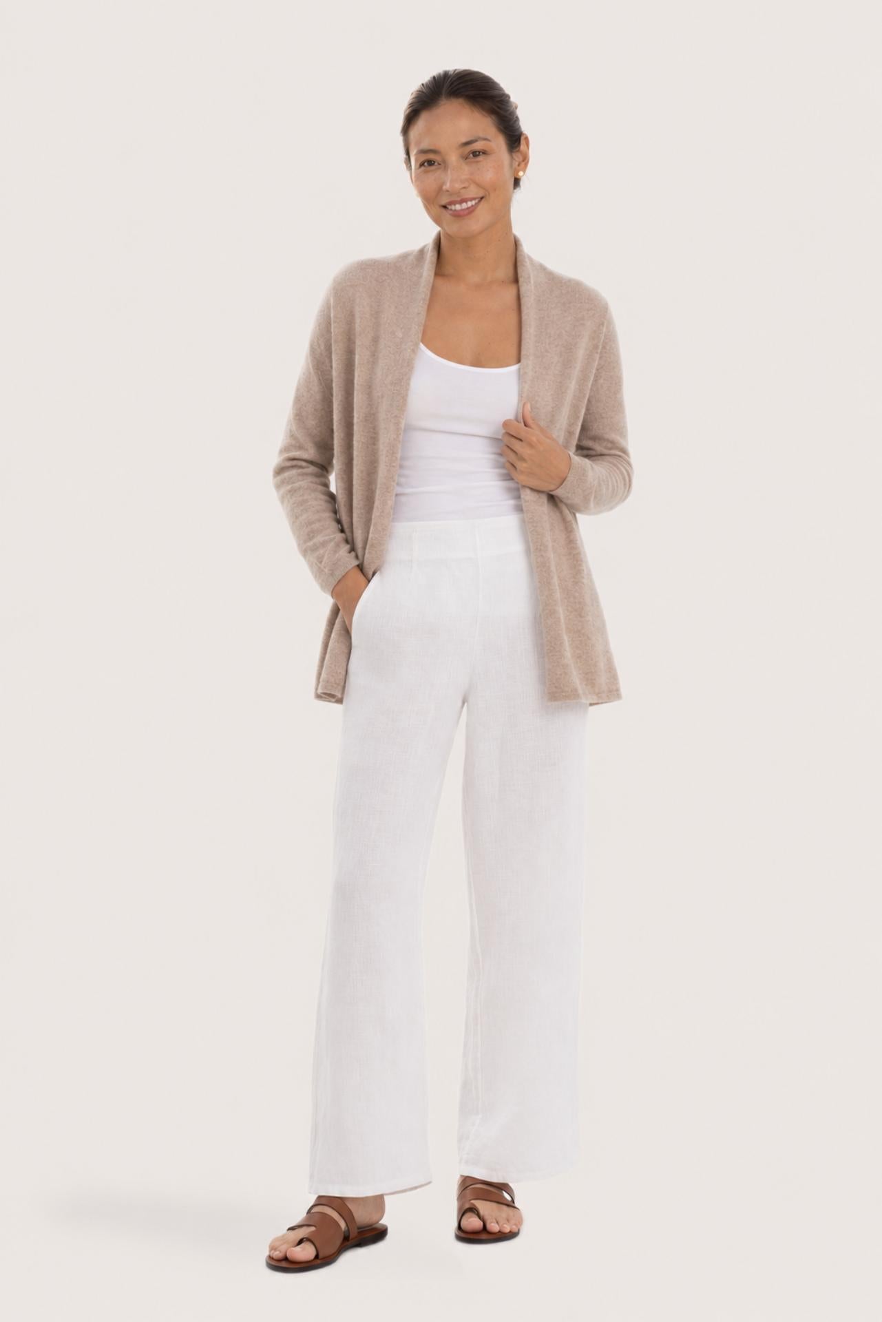 Woman wearing the beige cashmere Klarr outerwear by By The Sea Bali