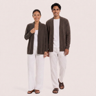 Couple wearing the brown cashmere Klarr outerwear by By The Sea Bali