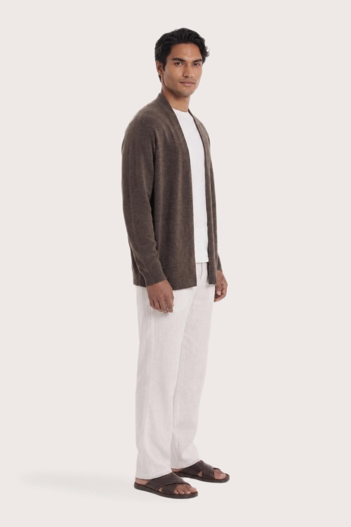 Side profile of a man wearing the brown cashmere Klarr outerwear