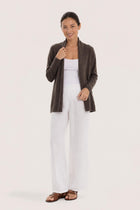 Woman wearing the brown cashmere Klarr outerwear by By The Sea Bali