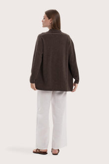 Back view of the grey cashmere outerwear with a relaxed and elegant silhouette