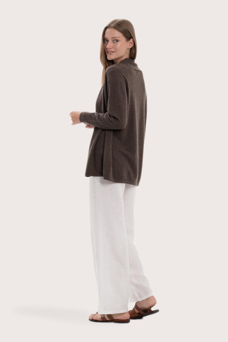 Side profile of the grey cashmere outerwear showcasing its soft drape and refined fit