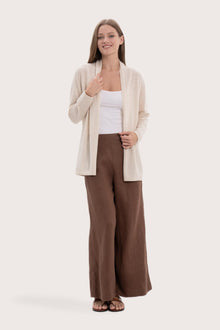 Model wearing the natural cashmere Klarr outerwear by By The Sea Bali