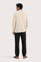 Back view of a man wearing the natural cashmere Klarr outerwear