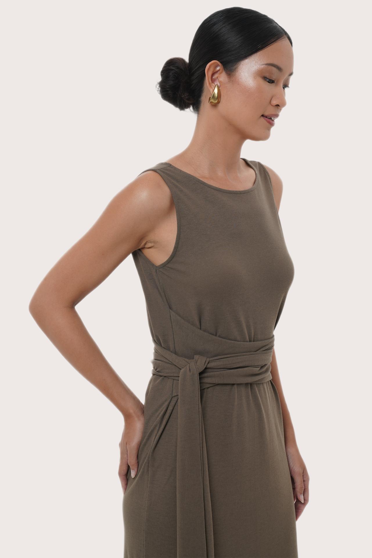 Side profile detail of the Kyra Dress  Brown Grey showcasing its graceful drape and relaxed fit
