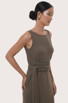 Side profile detail of the Kyra Dress  Brown Grey showcasing its graceful drape and relaxed fit