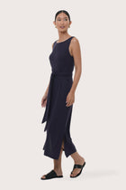 By The Sea Bali Side profile of the Kyra Dress showcasing its graceful drape and relaxed fit