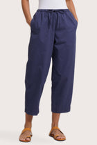 Close up detail of the Ladies Cropped Cotton Pants Navy highlighting craftsmanship and design features.