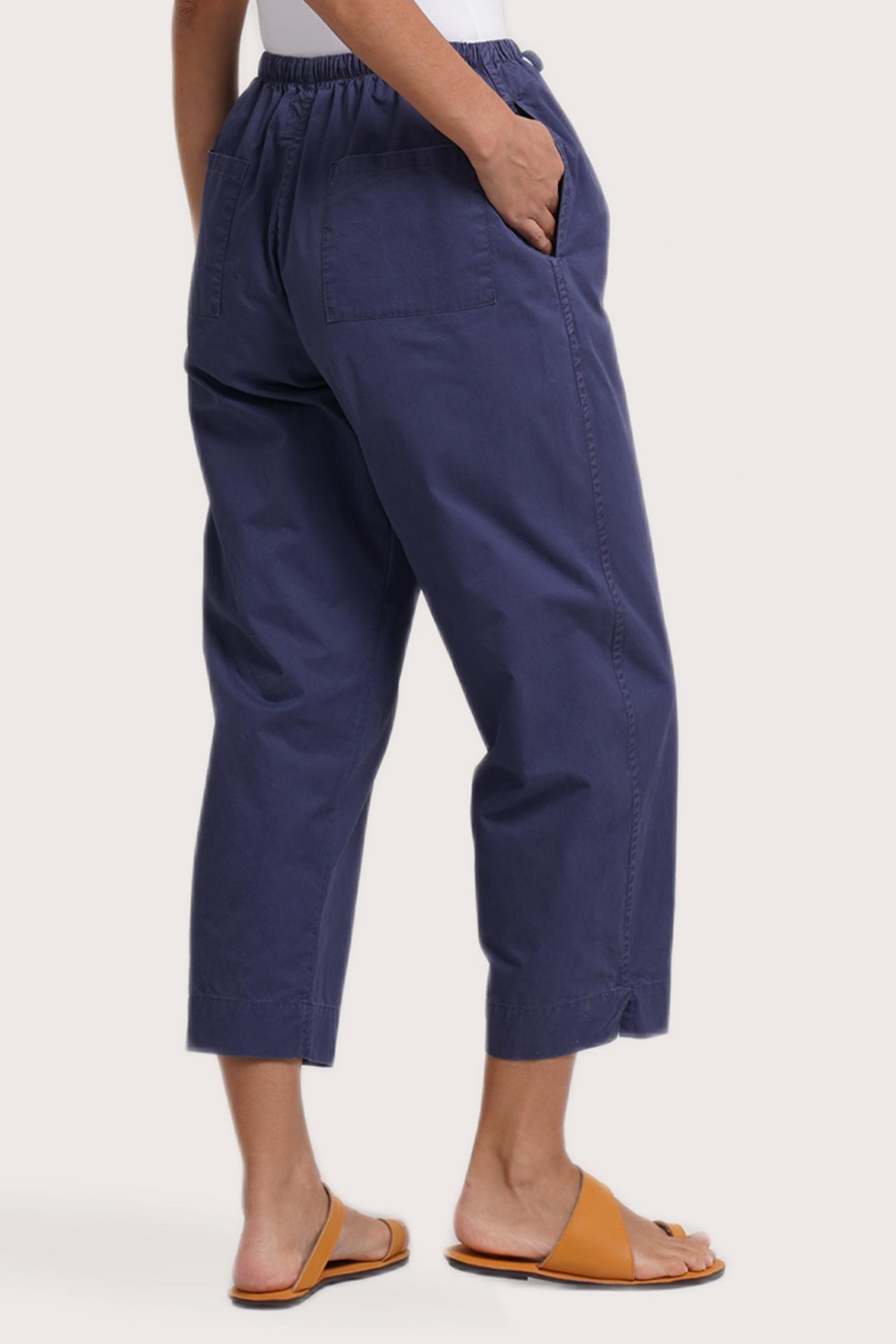 Close up detail of the Ladies Cropped Cotton Pants Navy highlighting craftsmanship and design features.