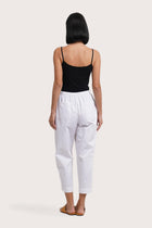 Back view of the Ladies Cropped Cotton Pants White highlighting the garment shape and drape