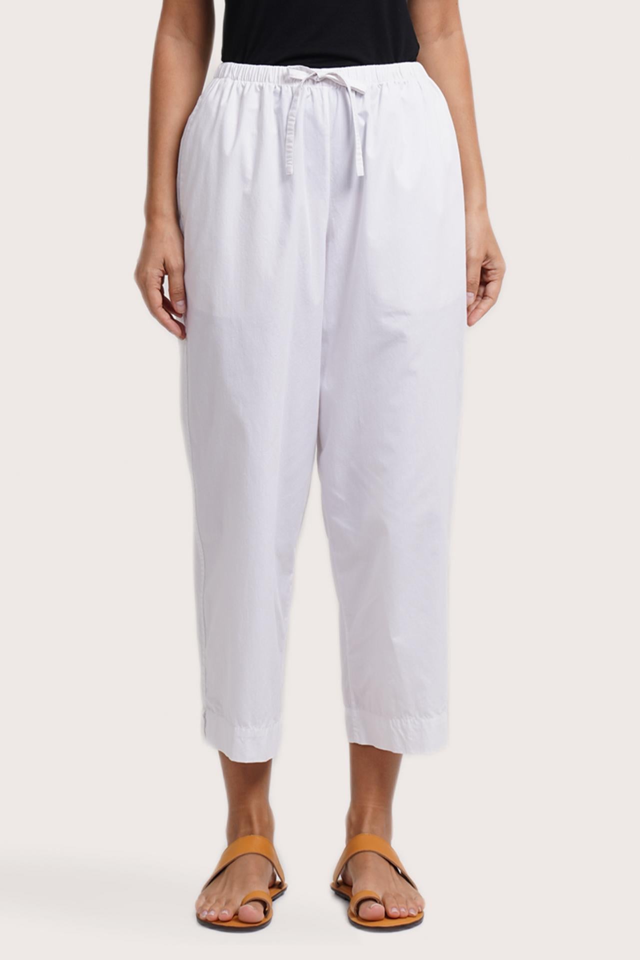 Close up detail of the Ladies Cropped Cotton Pants White highlighting craftsmanship and design features.