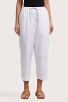 Close up detail of the Ladies Cropped Cotton Pants White highlighting craftsmanship and design features.