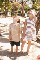 Resort-inspired styling featuring the Laguna Kids Cotton Dress in Stripe