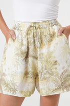 Close up detail of the Laica Linen Short The island Mulitcolor White Base highlighting craftsmanship and design features showing the weave and natural finish.
