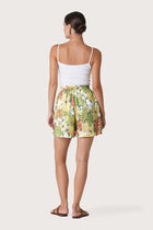 Back view of the Laica Linen Short Tropis Multicolor White Base highlighting the garment shape and drape