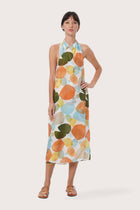 By The Sea Bali Laila Wrap Dress in Fun Polka Multicolor featuring an elegant wrap silhouette and vibrant polka dot print