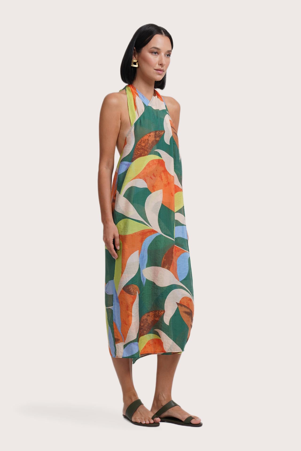 Side profile of the Laila Wrap Dress Magical Flora Back showing its cut and natural movement