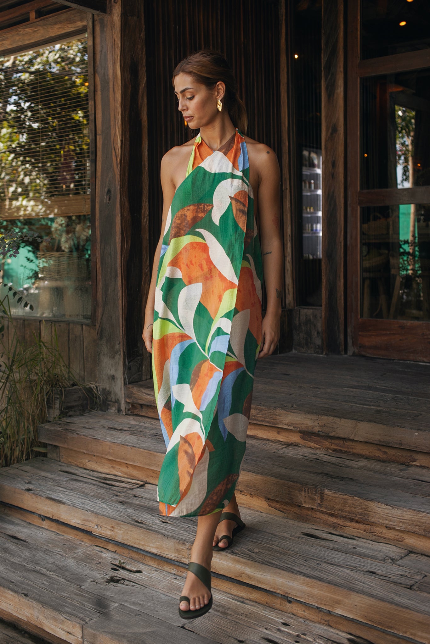 Woman wearing the Laila Wrap Dress Magical Flora designed for effortless resortwear and tropical living by By  The Sea Bali