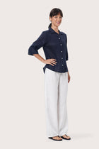 By The Sea Bali Side profile of the Laura Linen Shirt showcasing its relaxed fit and fluid drape