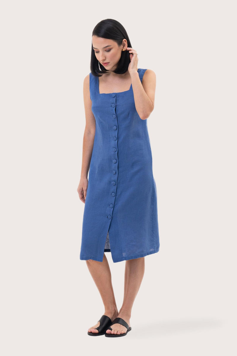 Side profile of the Linda Front Button Midi Linen Dress Royal Blue showing its cut and natural movement