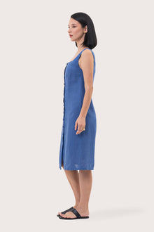 Side profile of the Linda Front Button Midi Linen Dress Royal Blue showing its cut and natural movement