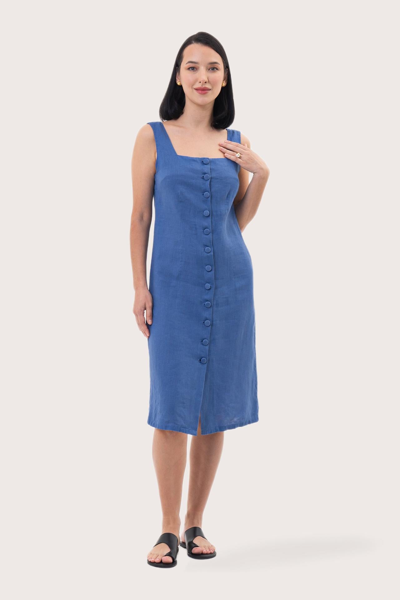 Woman wearing the Linda Front Button Midi Linen Dress Royal Blue designed for effortless resortwear and tropical living by By The Sea Bali