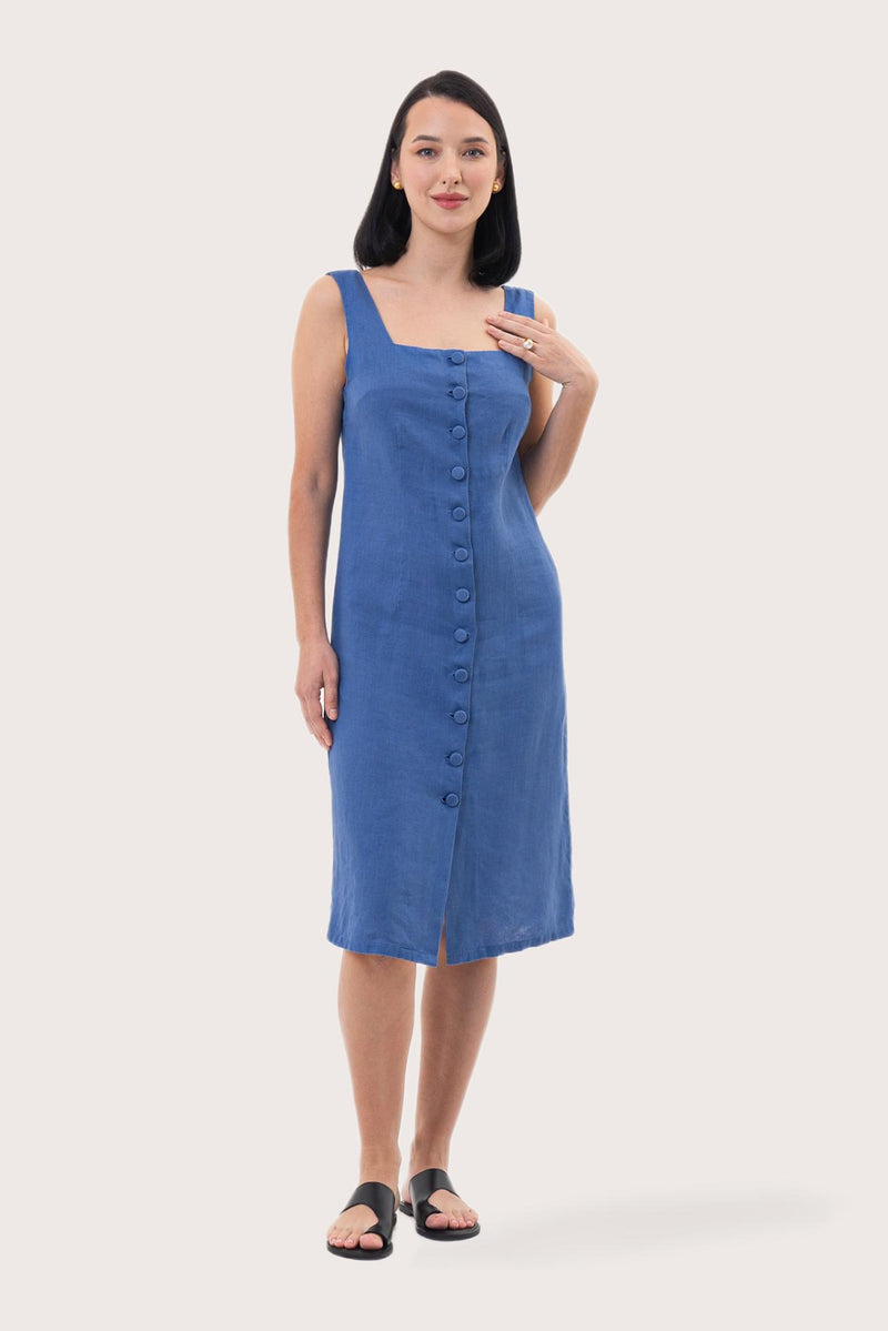 Woman wearing the Linda Front Button Midi Linen Dress Royal Blue designed for effortless resortwear and tropical living by By The Sea Bali