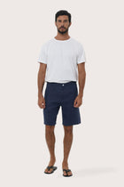 Model wearing the La Brisa linen bermuda shorts by By The Sea Bali