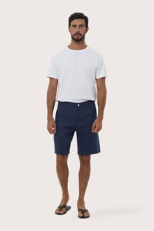 Model wearing the La Brisa linen bermuda shorts by By The Sea Bali