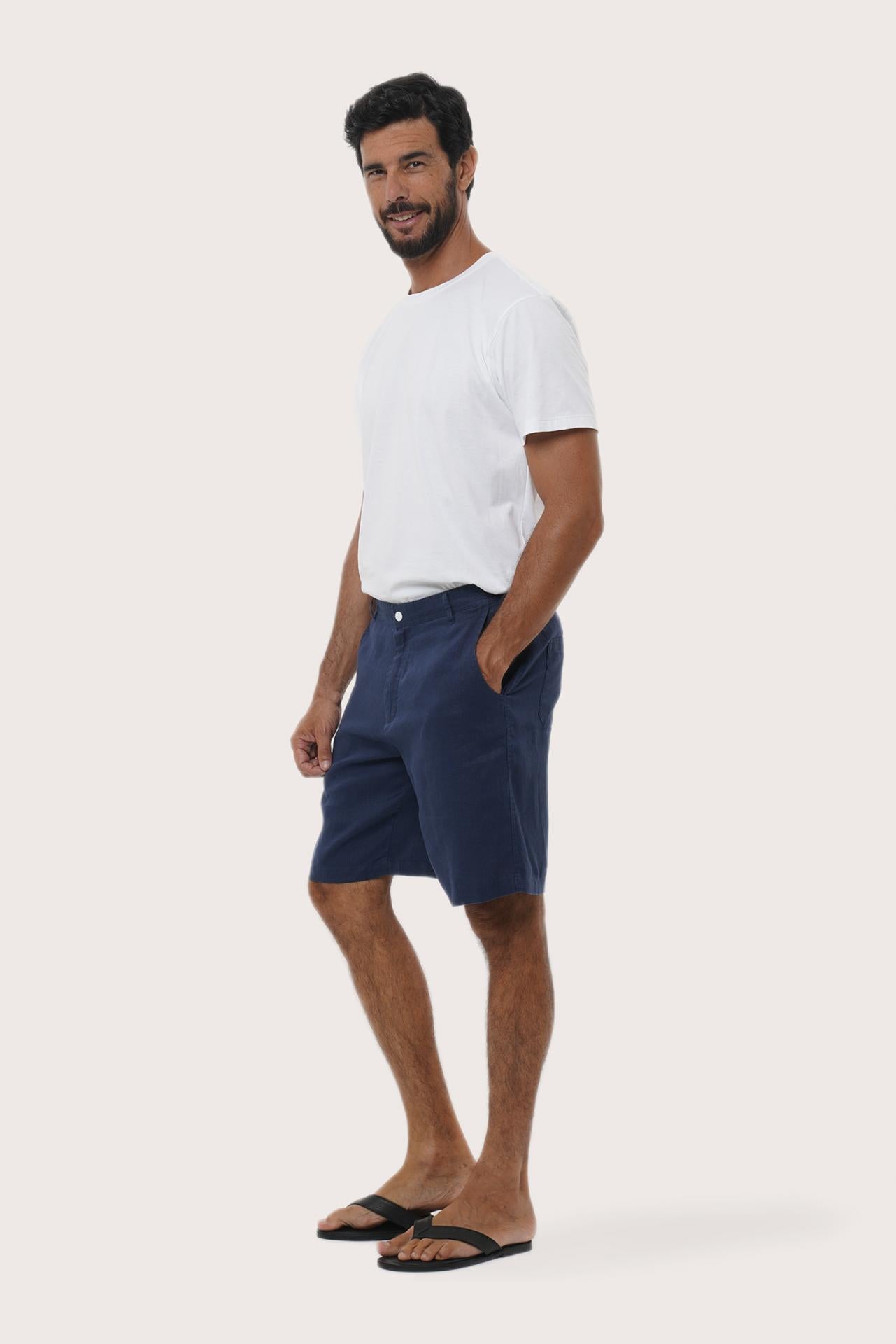Side profile of the La Brisa linen bermuda shorts showcasing their effortless fit